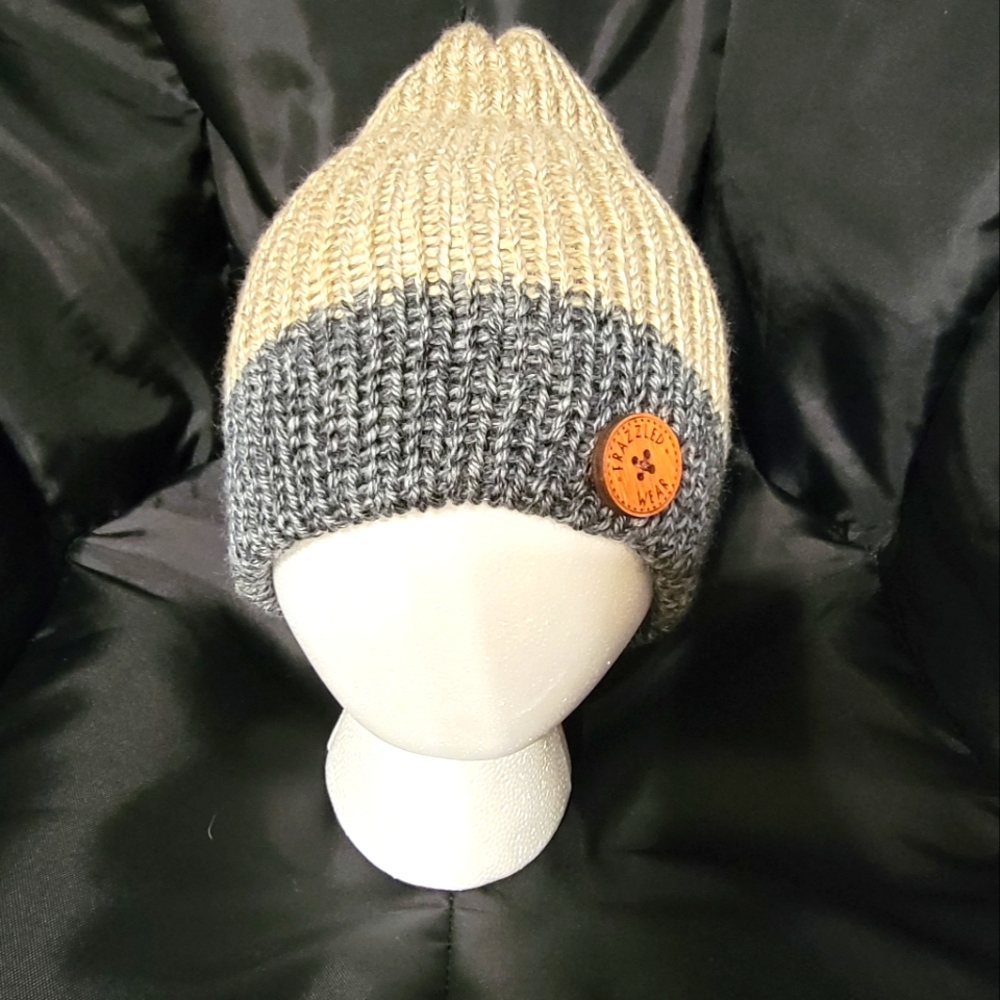 Handmade hat adult medium reversible tan and gray. Have several others.